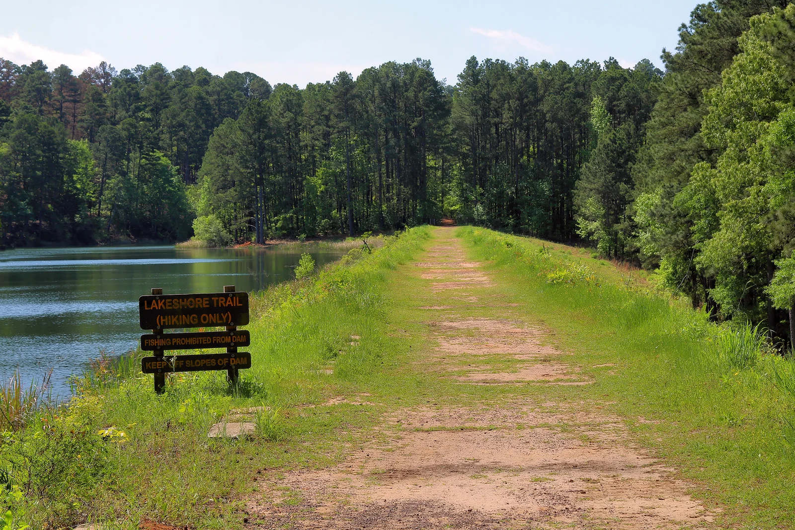Lakeshore Trail across the lake dam at Tyler State Park near Tyler, Texas